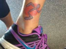 Hundreds get tattooed in honour of fitness chain